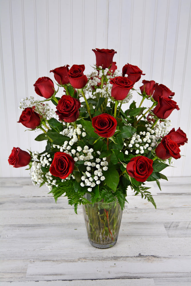 Two Dozen Long Stem Red Roses With Baby's Breath in a Vase  - Classic