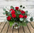 Premium Dozen Long Stem Roses with Exotic Greens in a vase